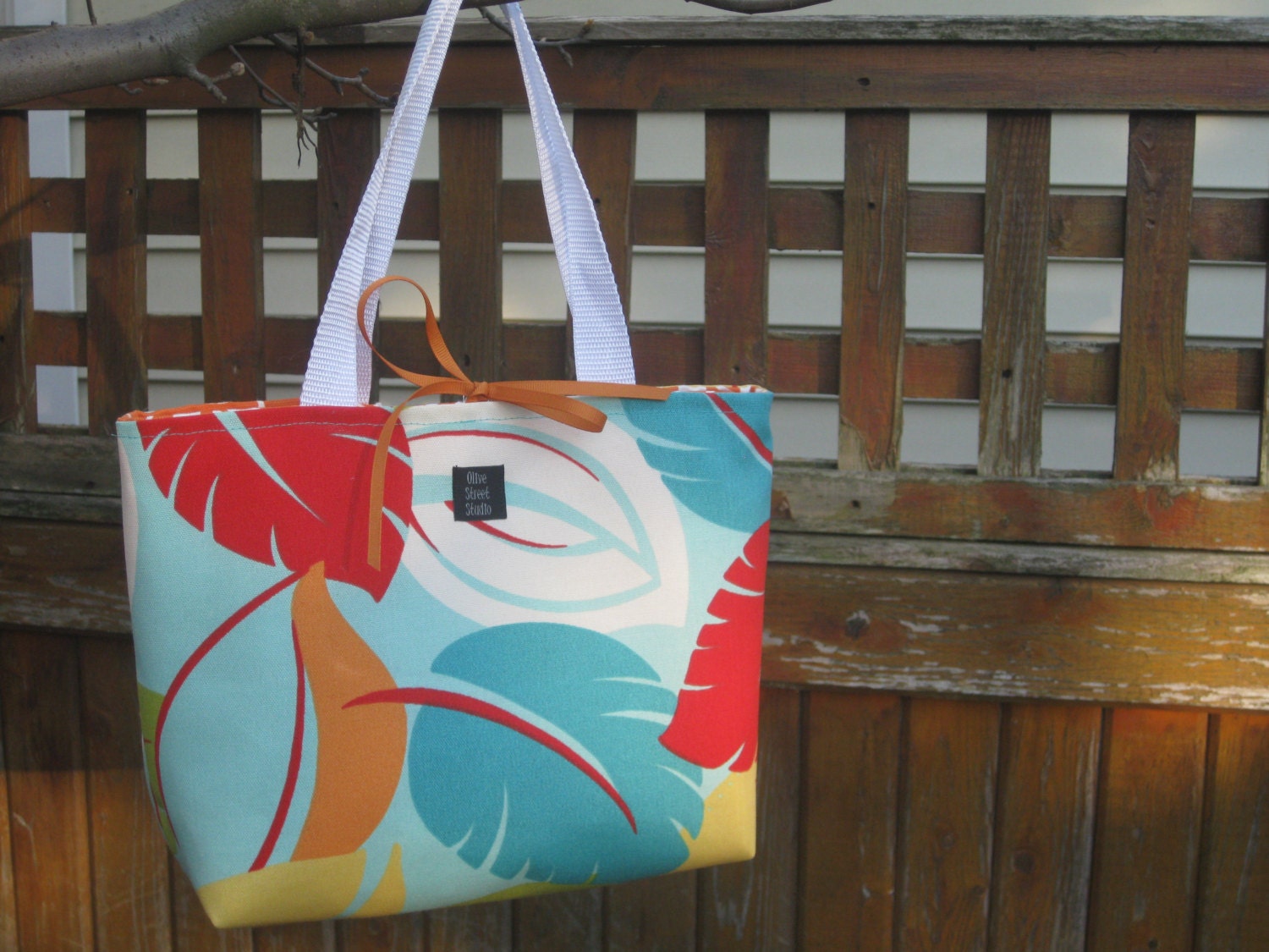 Bright medium handbag in Leaf fabric in teal, red, orange, green, white, yellow REVERSIBLE