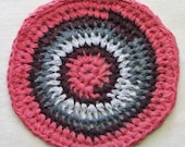 Round trivet, crocheted from eco-friendly cotton t-shirt yarn, large 10" diameter, sun-washed coral red and gray
