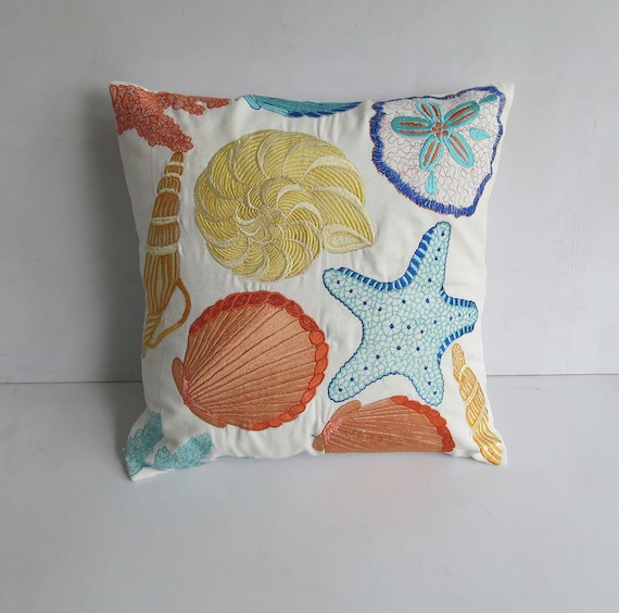 Sea themed pillow cover in off white with sea life embroidery 18X18 inch.