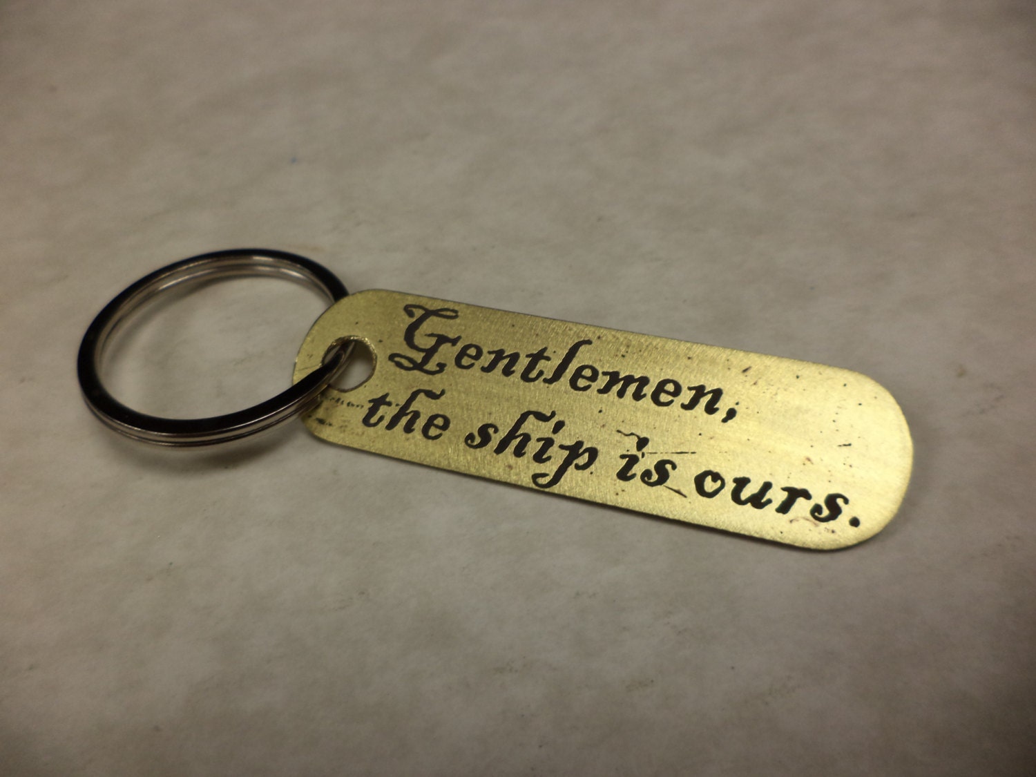 Pirates inspired etched brass keychain