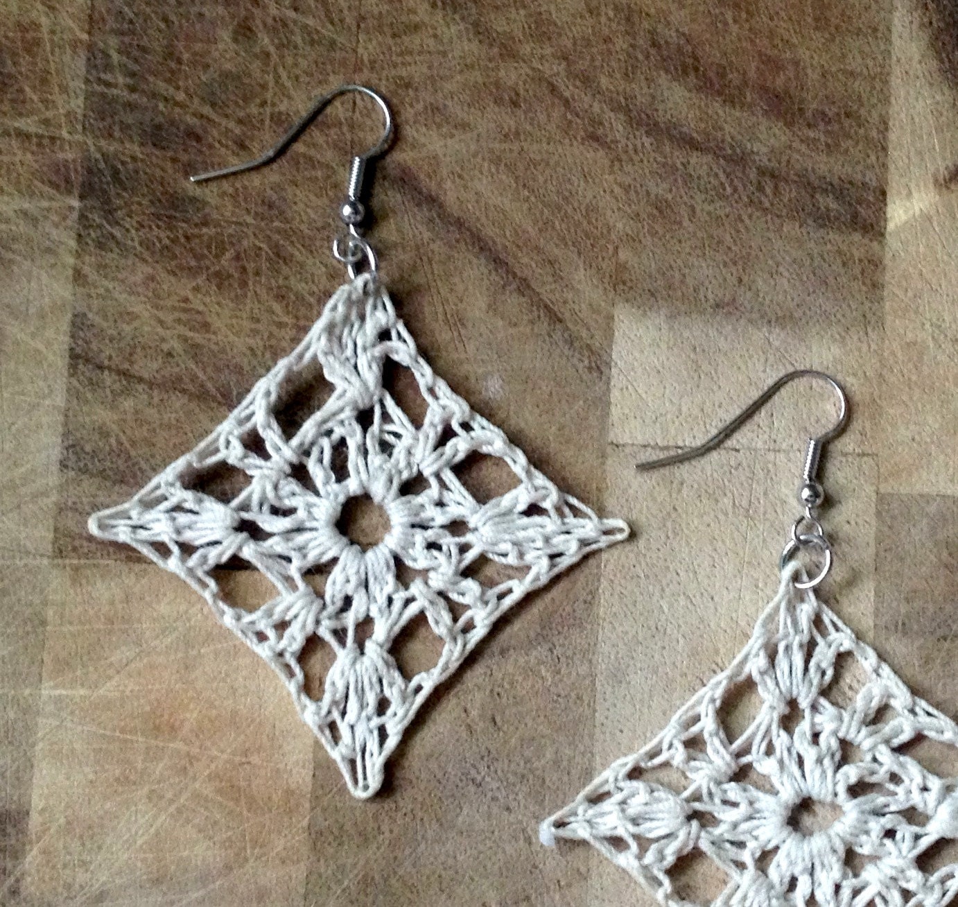 small lacy crochet granny square earrings . natural .