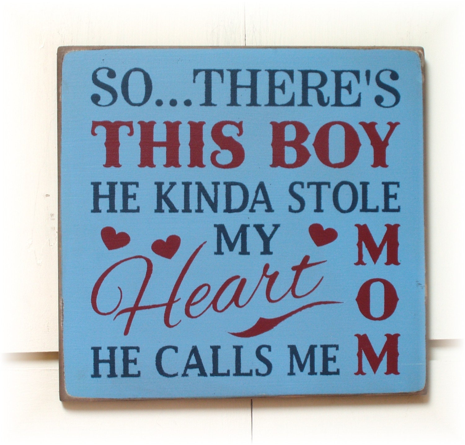 So there's this boy he kinda stole my heart he calls me Mom wood sign