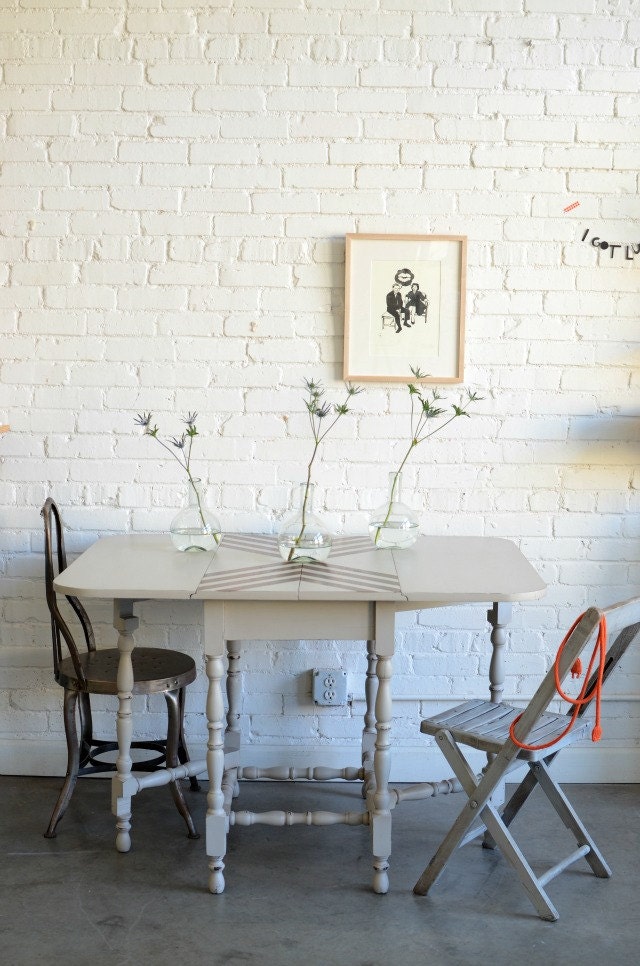 Chevron gate leg table named Cortilde