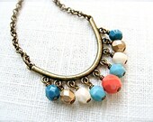 Multi colored boho chic necklace.  Colorful Czech glass beaded with antique brass components.