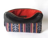 on sale. 12-inch Zipper Pouch: eco leather and hand woven ikat fabric