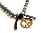 Blue cut stone antiqued bronze Peace charm leather necklace