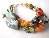 Turquoise boho bracelet, tribal jewelry with african trade beads, horn, silver dragonfly charm