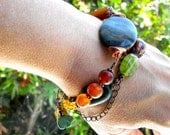Multi strand beaded bracelet, copper chain, stone, turquoise, horn, glass boho jewellery in blue, green, orange, brown, amber hues
