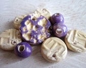 Assortment of Handmade Ceramic Beads and Pendants in Purple and Ivory