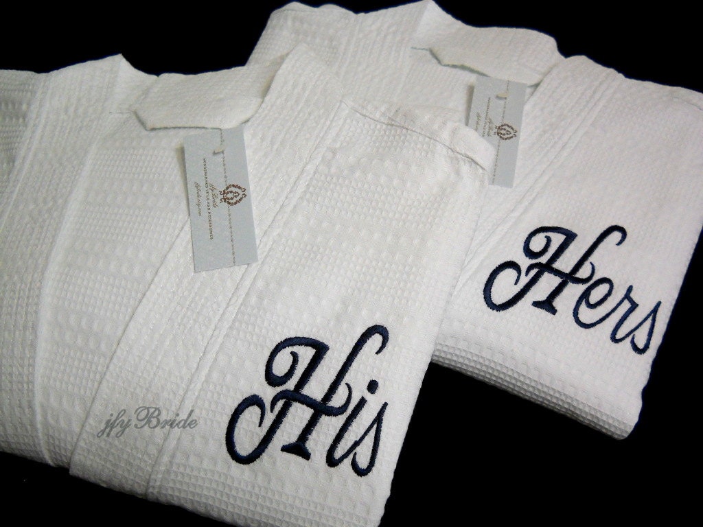 His and Hers Embroidered Waffle Weave Robe Set wrap yourself in cotton luxury.