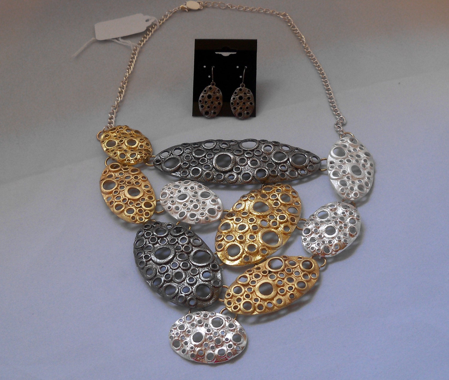 Planets in progress inspired by Salvatore Dali necklace set