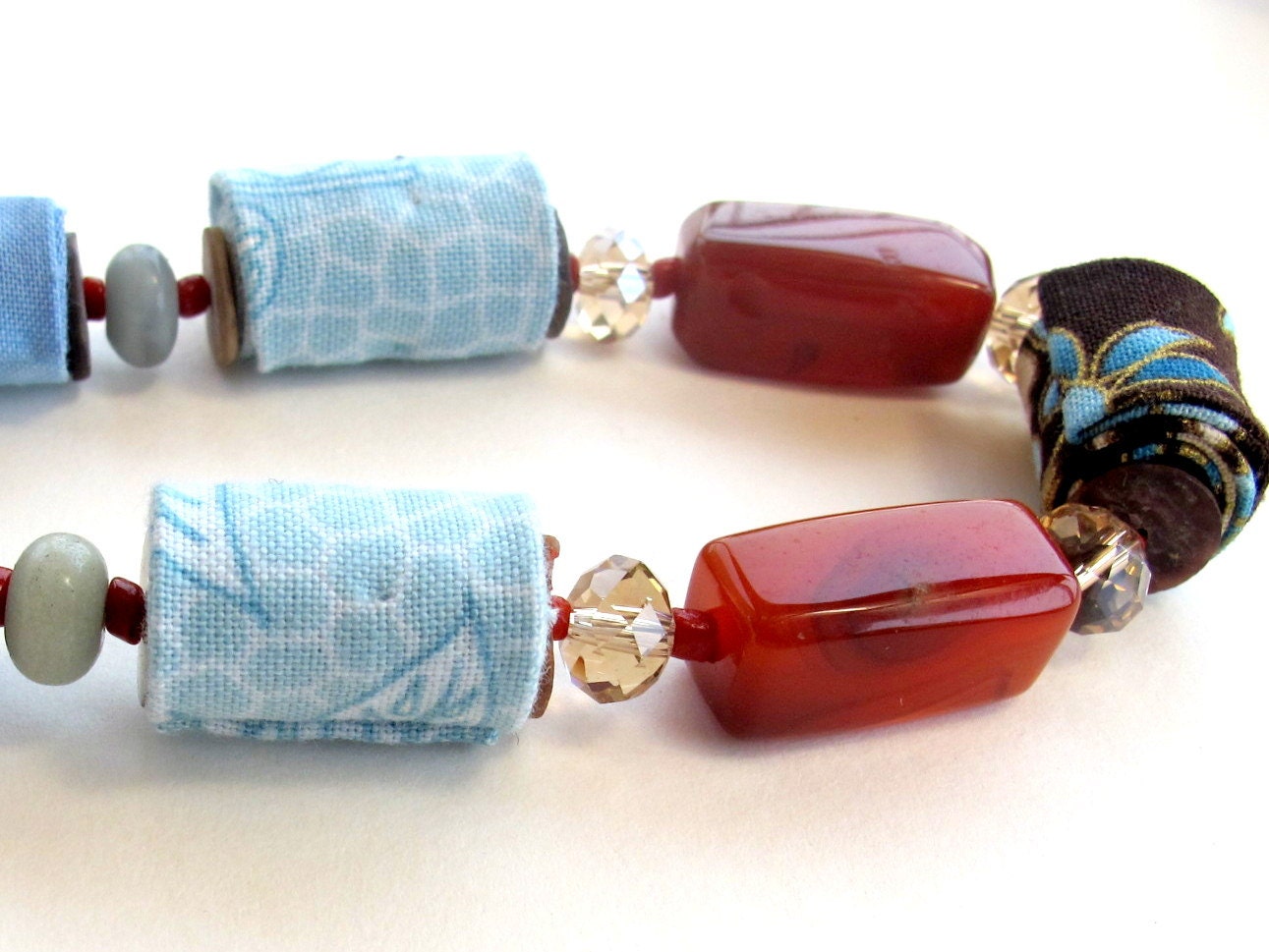 Artistic fiber necklace in honey and corn flower blue