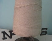 repurposed vintage brass weather vane base with vintage spool of string