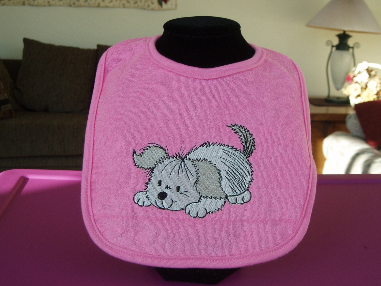 Pink Baby Bib with playful embroidered puppy