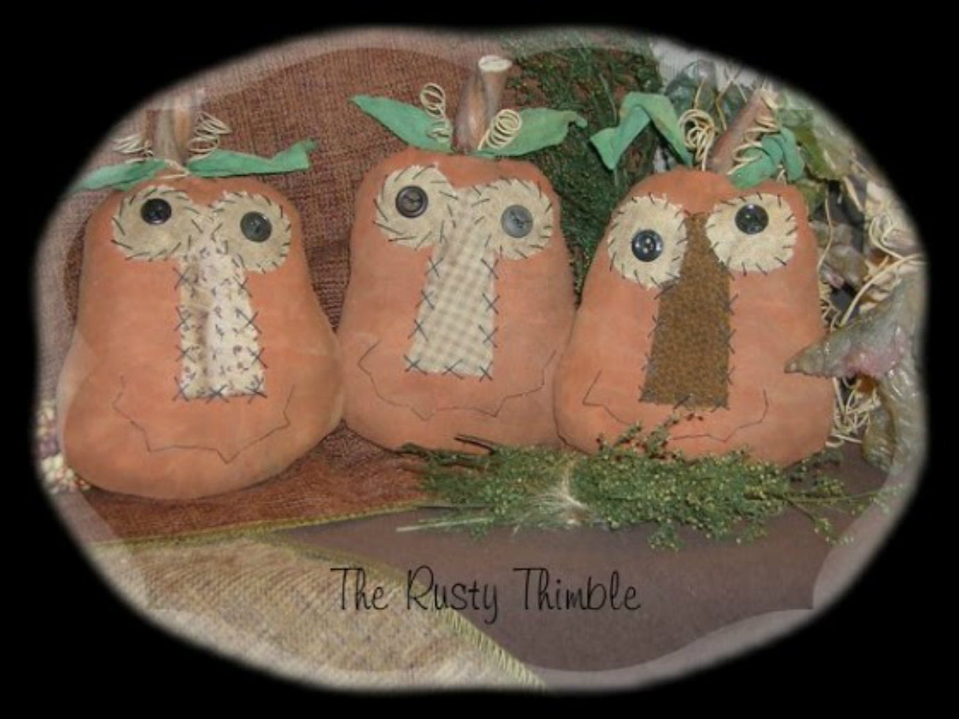 Primitive set of Three Pumpkin Heads