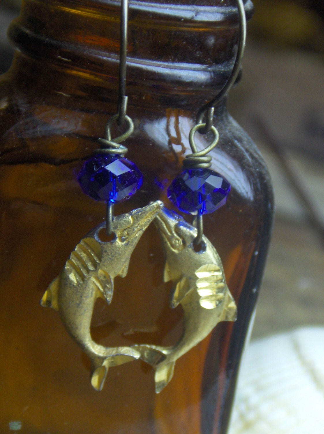 THE DELPHIC BLUE. Upcycled brass Dolphins and royal blue Czech glass rondelle earrings.handmade by Chymiera on Etsy