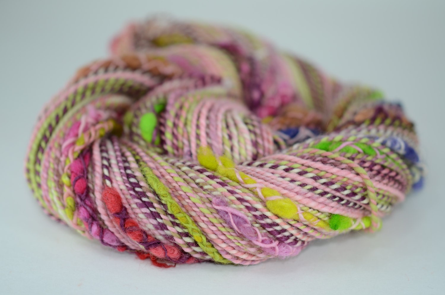 Pink Alligator - BFL and wool locks 2-ply handspun art yarn with trapped stacks - DK, 133 yards with bulky wool stacks
