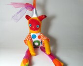 Orange and red plush party cat