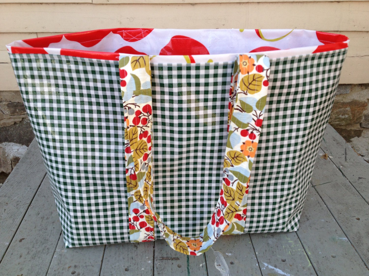 Large reversible oilcloth tote bag with forest green gingham and red apples