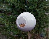 Modern Bird Feeder Birdfeeder Outdoor Birds Seed Holder Stylish Striking Contemporary Design White Acrylic Plastic Orb Globe Garden Decor
