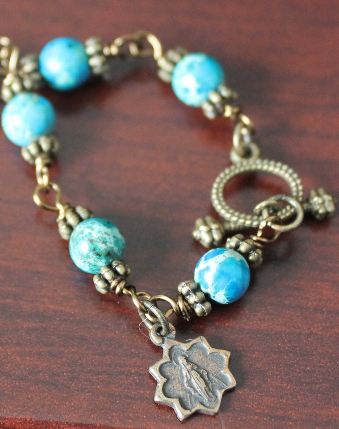 A sweet little Miraculous Medal bracelet, wire wrapped with beautiful jasper stones