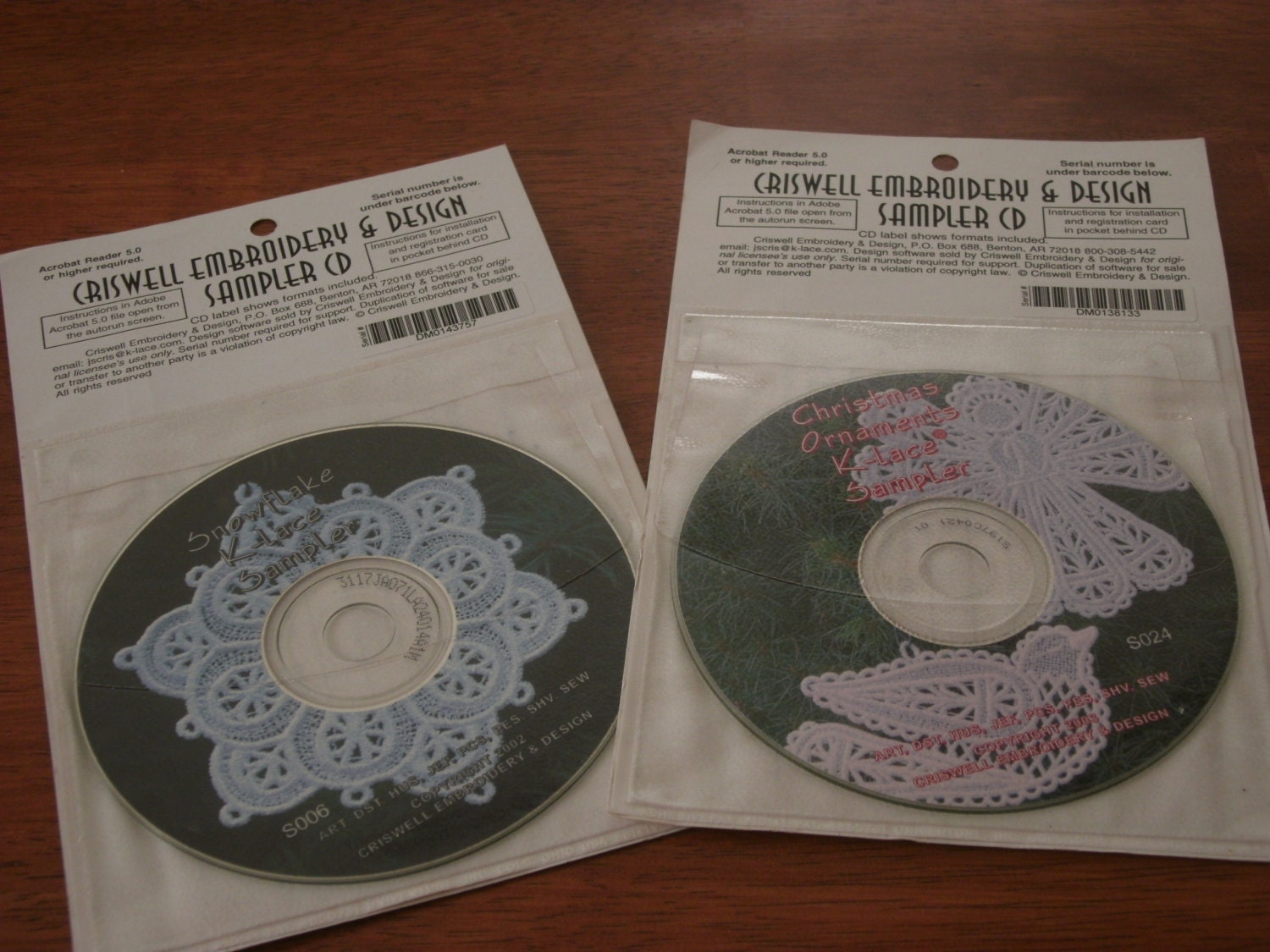 2 CD's with  Criswell Christmas ornament Embroidery designs