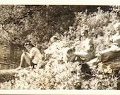 Vintage Photo of a Man and Three Women Sitting and Drinking Beer