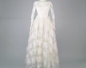 Vintage 1950s lace wedding dress with full maxi skirt