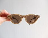 Vintage designer sunglasses with handcarved wooden frames
