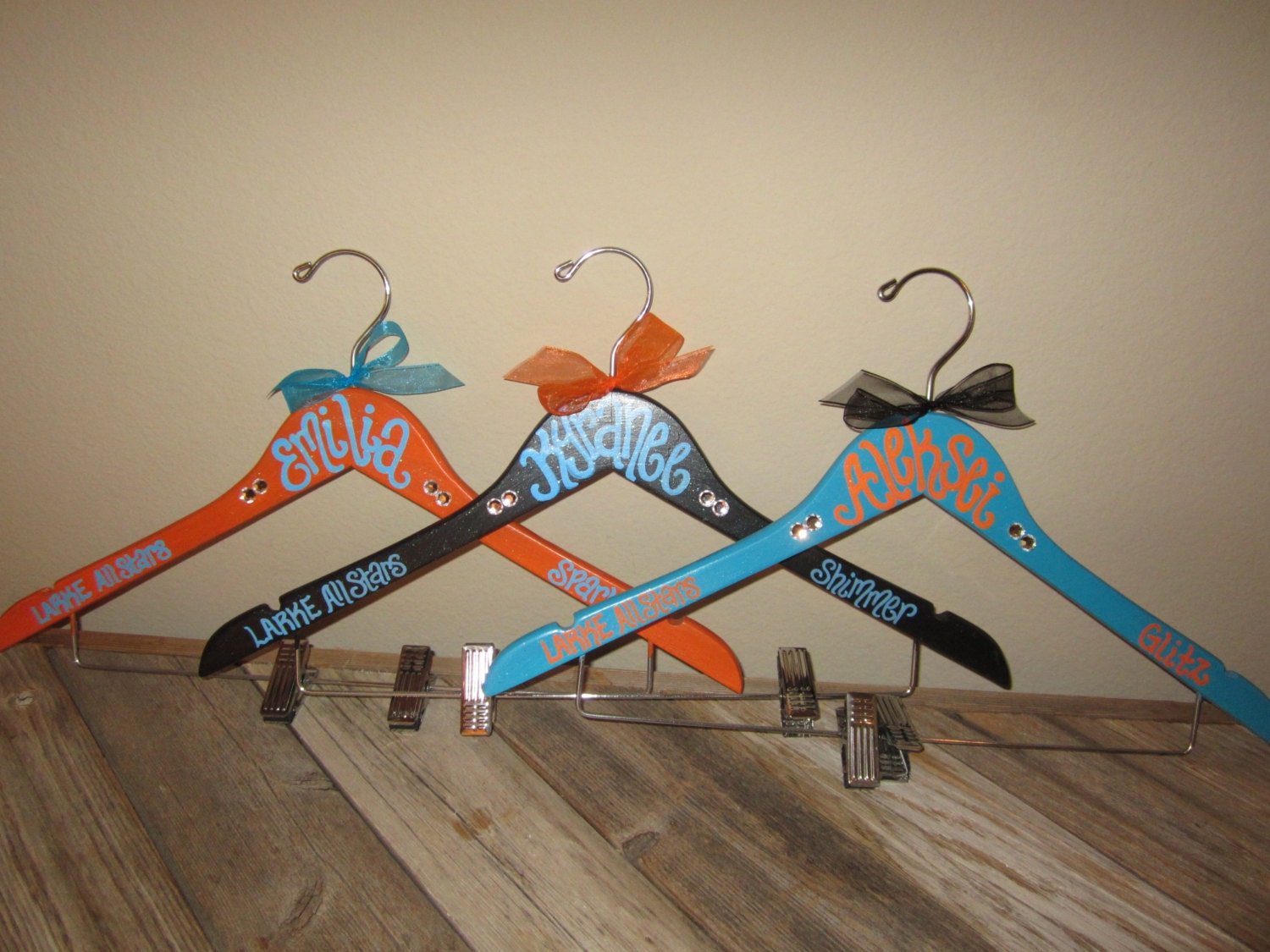 custom painted CHEER or DANCE or POM squad hangers for schools or competitions