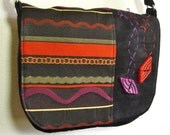 cute handbag in black, red and purple