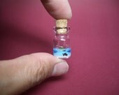 A turtle in an uninhabited island in a tiny bottle blue ver.2