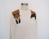 Wrapped Fox crew neck sweater in cream