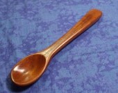 Hand carved baby spoon in rich cherry wood
