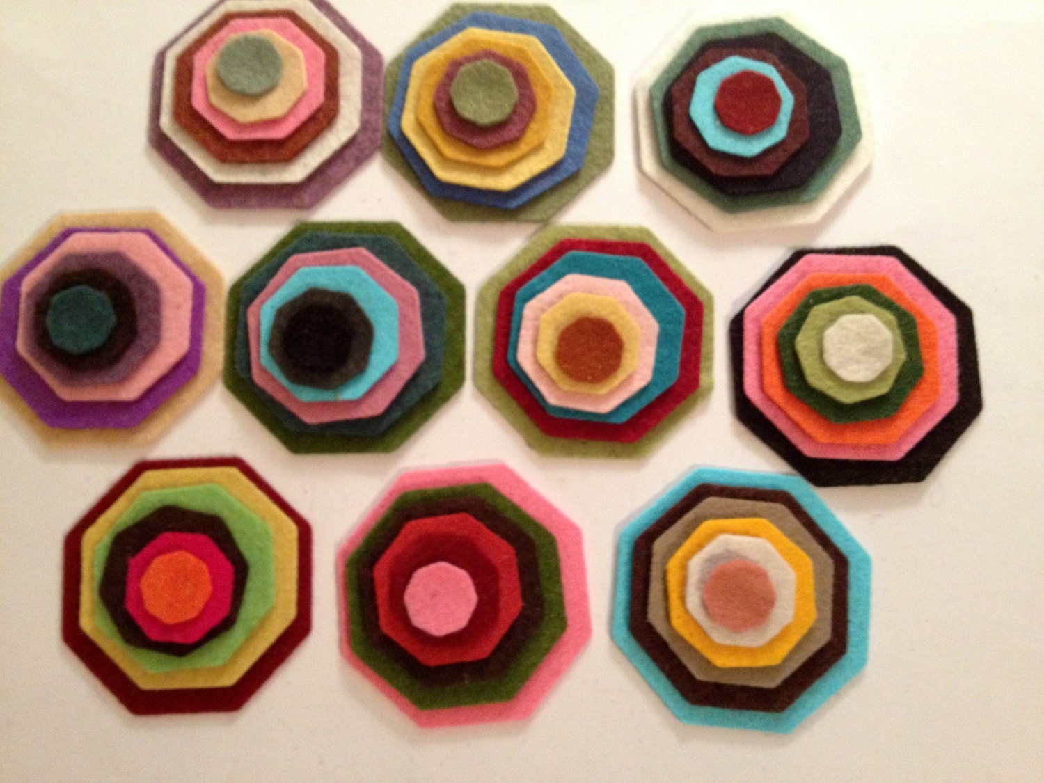 Wool Felt Octagons 60 total -  Sizes 5/8in - 2 1/8in Random Colored. 1809