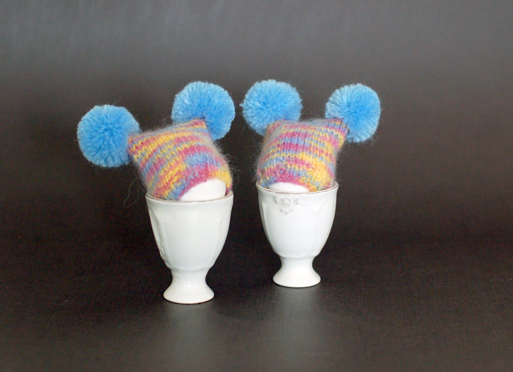 Multicolor egg warmers with blue poms