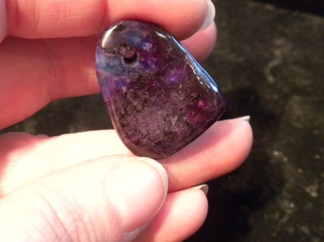 Drilled Sugilite with Richterite