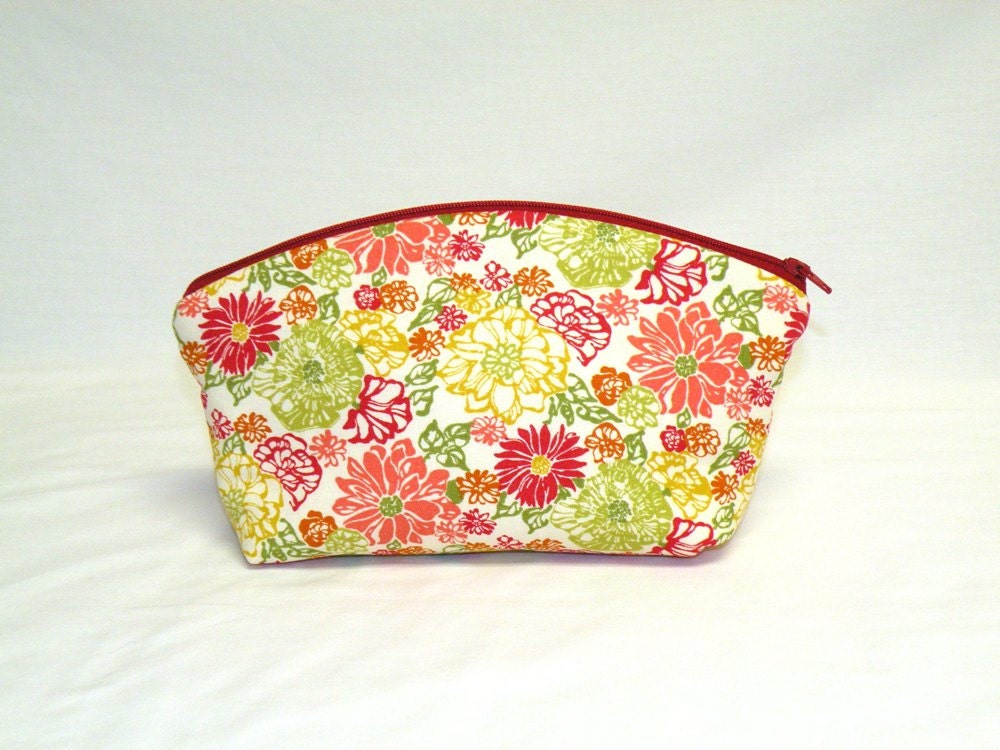 Extra Large Domed Make-Up Bag in a citrus floral print in red, orange, yellow and greens