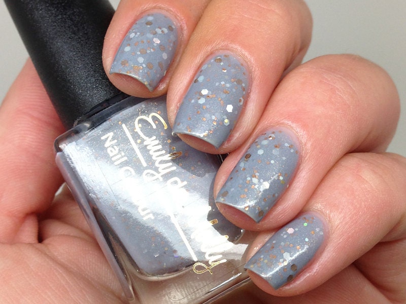 Nail polish - "Pyrite" bronze, gold and silver glitter in a grey base