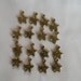 Set of 12 Small Gold Tone Starfish Charms