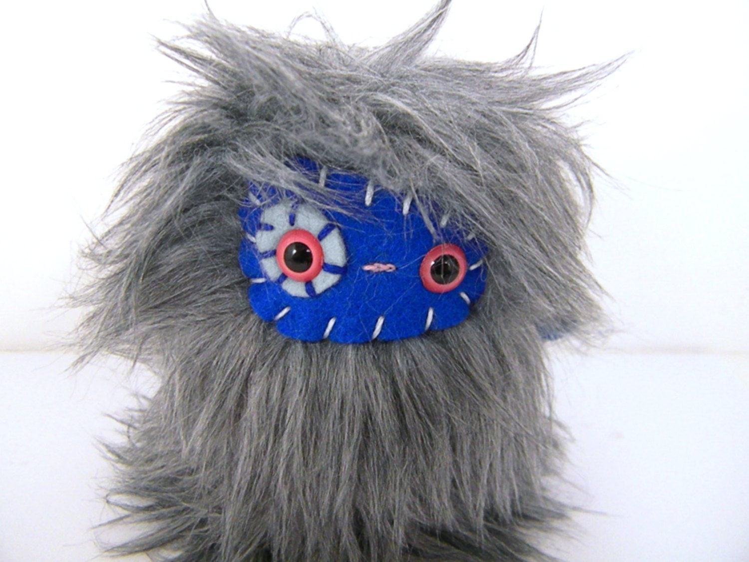 Ben the plush monster miniature grey and royal blue stuffed animal Little Uggle