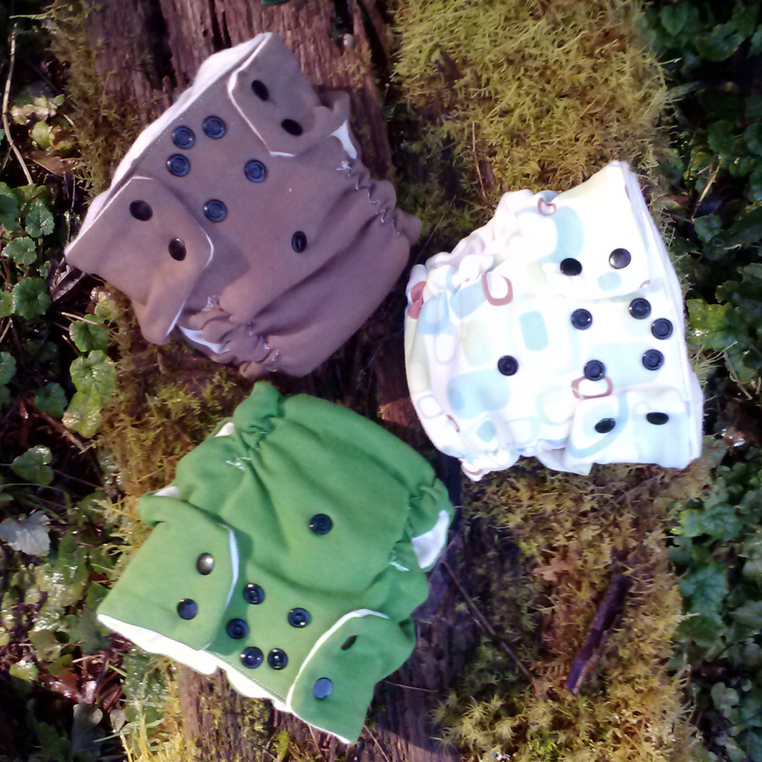 small set of 3 organic cotton fitted diapers various colors and prints
