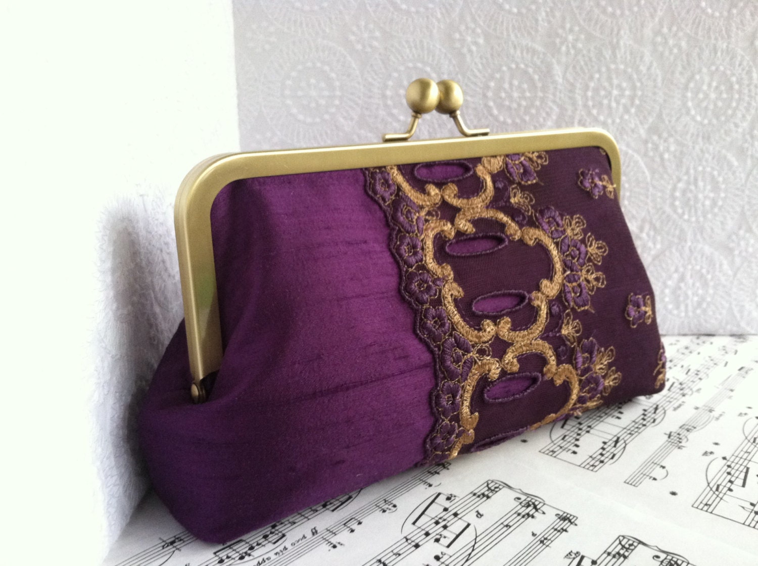 Purple silk clutch bag with bronze lace overlay