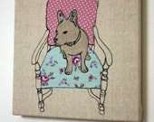 Dog sat on a chair canvas