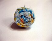 Pool blue, aqua floral pattern torn fabric rosette ring on adjustable silvertone band
