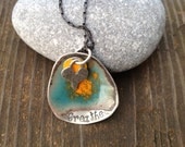 Silver yoga necklace enameled blue and orange with custom stamp "breathe"
