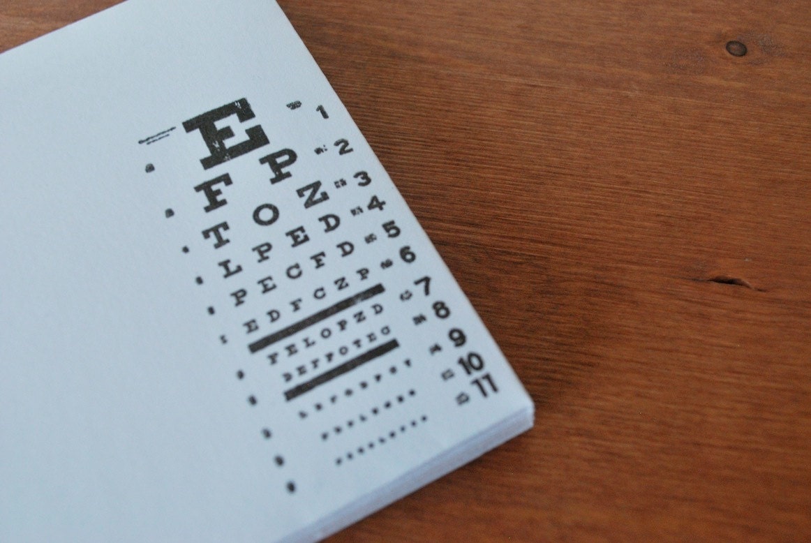 white envelopes stationery set: eye chart