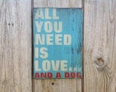 Wooden sign all you need is love and a dog