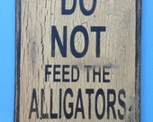 DO NOT feed the alligators sign made from reclaimed plywood