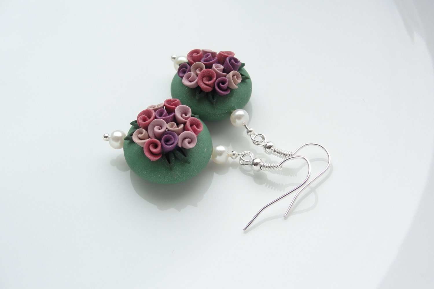 Vintage rose style polymer clay earrings in green, pink and purple